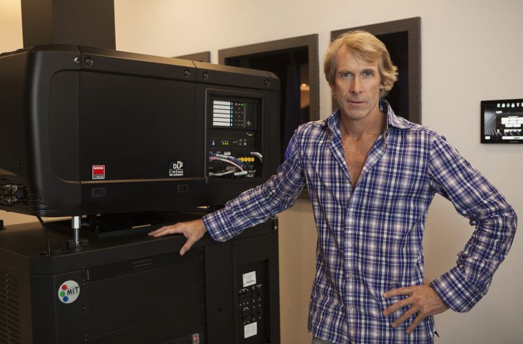 Director Michael Bay in his projection room with a Barco Projector